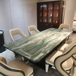 Green Veined Marble Dining Table with High-Gloss Dark Angled Pedestal and Stone Inlay Accents